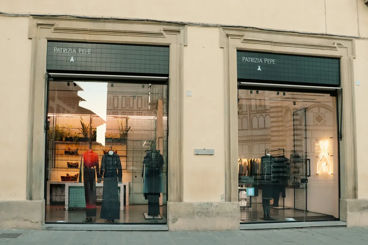Patrizia Pepe fashion store in Florence, Italy showcasing stylish displays and modern architecture.